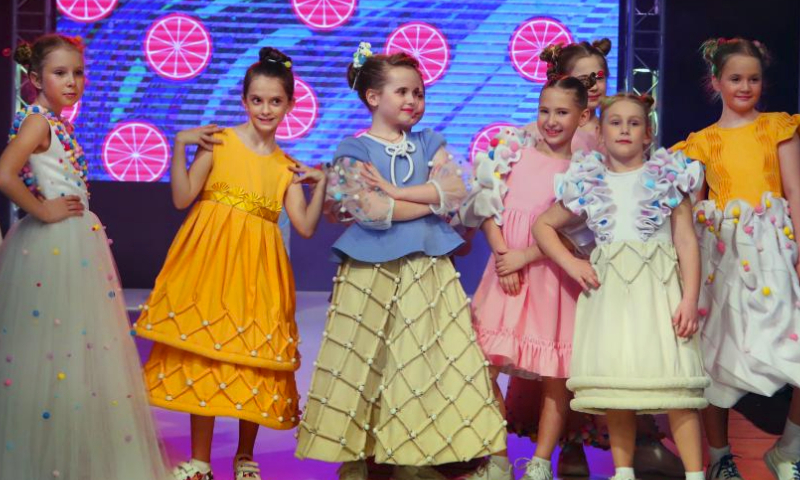 Young models present creations during a fashion show in Minsk, Belarus, April 5, 2024. (Photo by Henadz Zhinkov/Xinhua)
