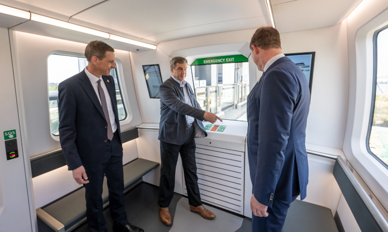 Markus Soder (center), Governor of German state Bavaria, visits Xinzhuluqiao Machinery Ltd. in Chengdu, Southwest China’s Sichuan Province and takes a ride on a maglev train on March 25, 2024. 