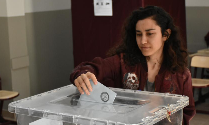 A voter casts her vote at a polling station in Istanbul, Türkiye, March 31, 2024. Voters flocked to the polls on Sunday in Istanbul, Türkiye's financial and cultural hub, for the country's local elections. (Photo by Safar Rajabov/Xinhua)