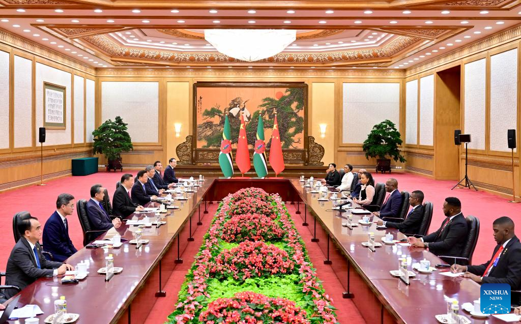Chinese President Xi Jinping meets with Prime Minister of the Commonwealth of Dominica Roosevelt Skerrit at the Great Hall of the People in Beijing, capital of China, March 25, 2024. Photo: Xinhua