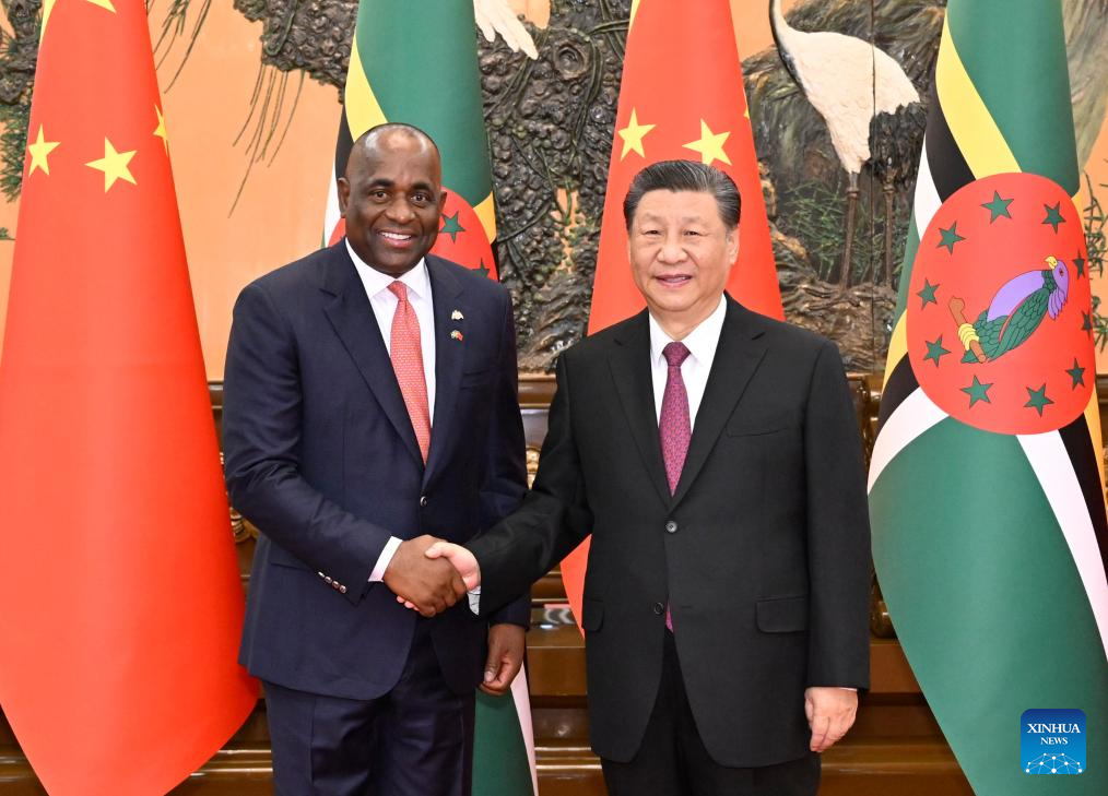 Chinese President Xi Jinping meets with Prime Minister of the Commonwealth of Dominica Roosevelt Skerrit at the Great Hall of the People in Beijing, capital of China, March 25, 2024. Photo: Xinhua
