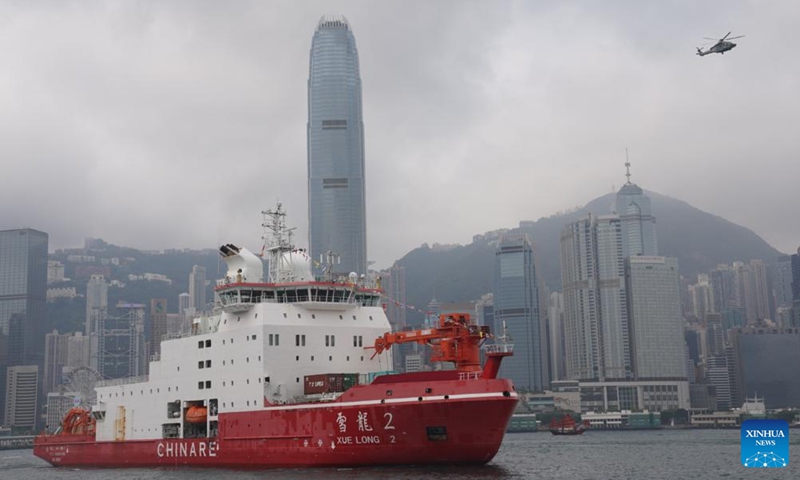 China's polar icebreaker Xuelong 2, or Snow Dragon 2, enters the Ocean Terminal in Tsim Sha Tsui, Hong Kong, south China, April 8, 2024. China's first domestically made polar icebreaker Xuelong 2, or Snow Dragon 2, arrived in Hong Kong for the very first time on Monday for a five-day visit. (Xinhua/Lui Siu Wai)


