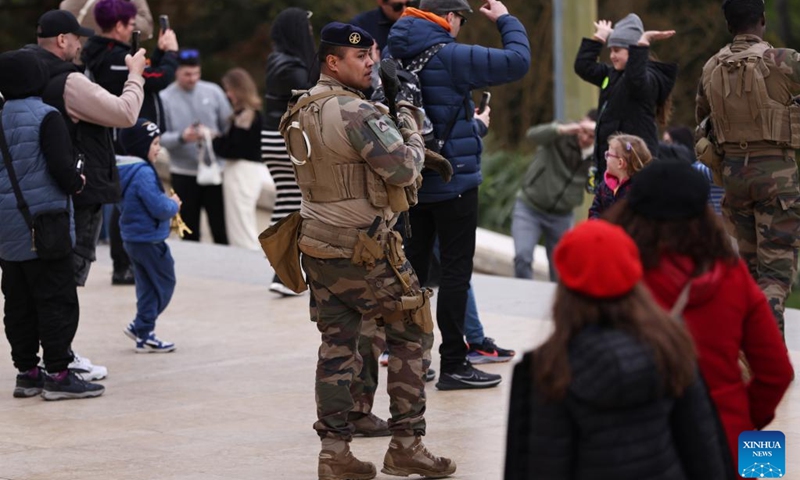 A French soldier patrols at the Trocadero place near the Eiffel Tower in Paris, France, on March 25, 2024. The French government decided on Sunday to raise the national security alert system Vigipirate to its highest level to deal with the potential threat the country is facing after Friday's deadly terrorist attack in Russia's capital Moscow.(Photo: Xinhua)