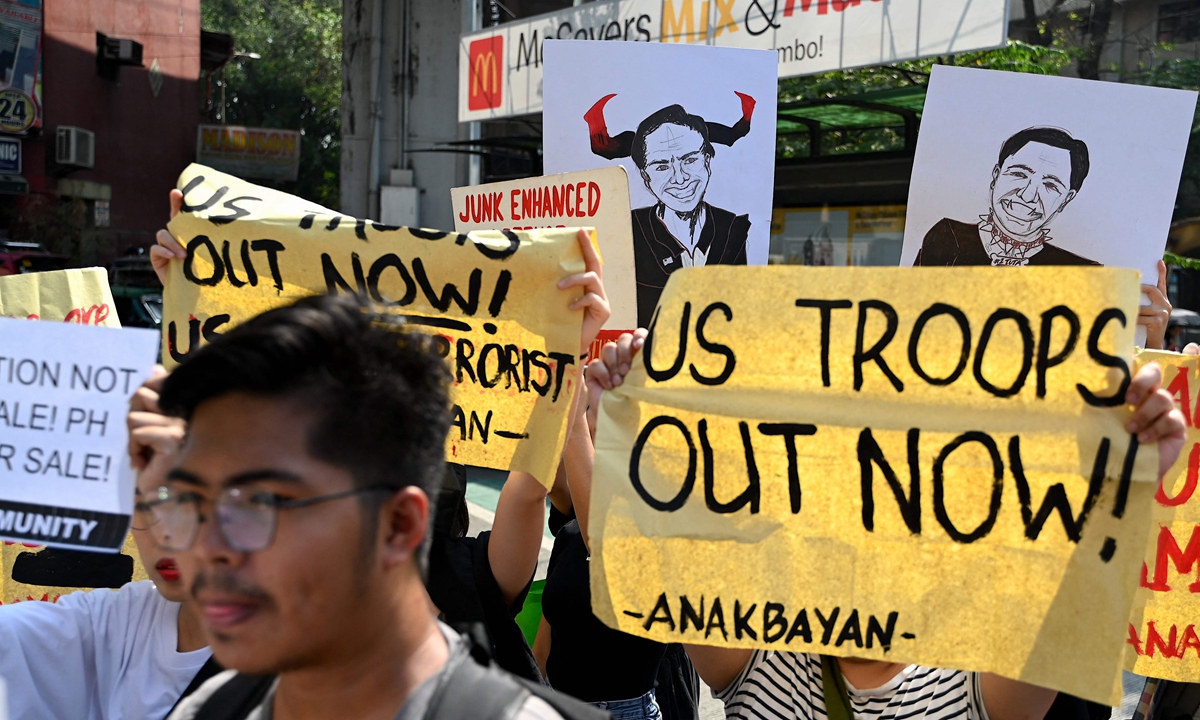 People protest with signs and placards on Mendiola Street against the visit of US Secretary of State Antony Blinken to the Philippines in Manila, on March 19, 2024.Photo: VCG