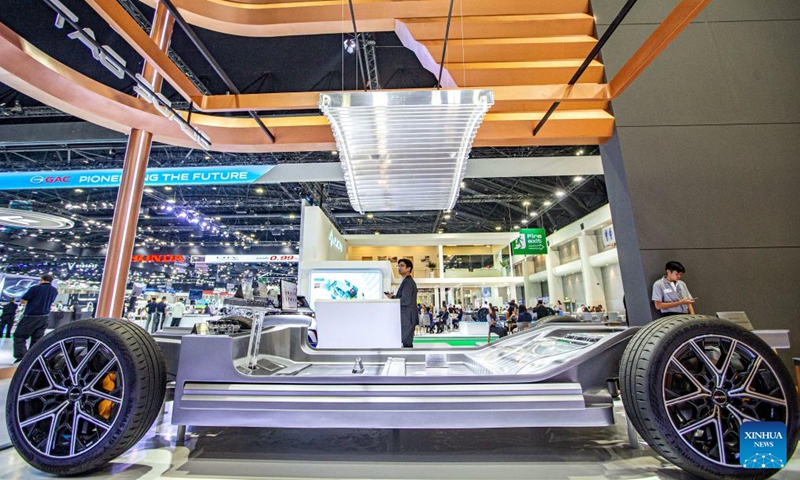 A visitor looks at a BYD e-Platform 3.0 during the 45th Bangkok International Motor Show in Bangkok, Thailand, March 27, 2024. The 45th Bangkok International Motor Show kicked off here on Wednesday and will last until April 7.(Photo: Xinhua)
