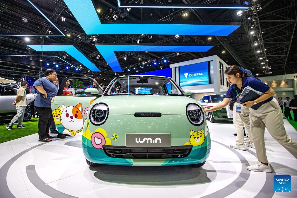 Visitors look at a Lumin of Changan Auto during the 45th Bangkok International Motor Show in Bangkok, Thailand, March 27, 2024. The 45th Bangkok International Motor Show kicked off here on Wednesday and will last until April 7.(Photo: Xinhua)