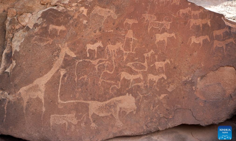 This photo taken on March 26, 2024 shows an engraved slab at the Twyfelfontein rock engraving site in Kunene Region, Namibia. Twyfelfontein is one of the largest and most concentrated sites of rock engravings in Africa to date. The site was recognized by UNESCO as Namibia's first World Heritage in 2007.(Photo: Xinhua)