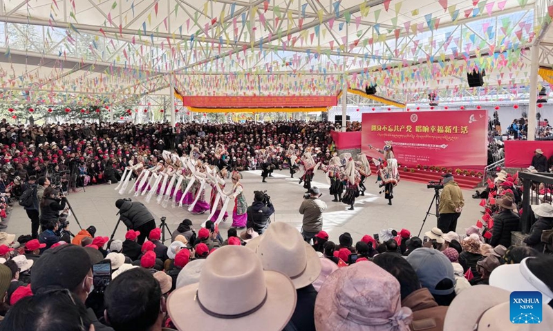 People watch a performance at a park to celebrate the Serfs' Emancipation Day in Lhasa, capital of southwest China's Xizang Autonomous Region, March 28, 2024. On March 28, 1959, people in Xizang launched the democratic reform, freeing a million serfs. In 2009, the regional legislature announced March 28 as the day to commemorate the emancipation of the one million serfs.(Photo: Xinhua)