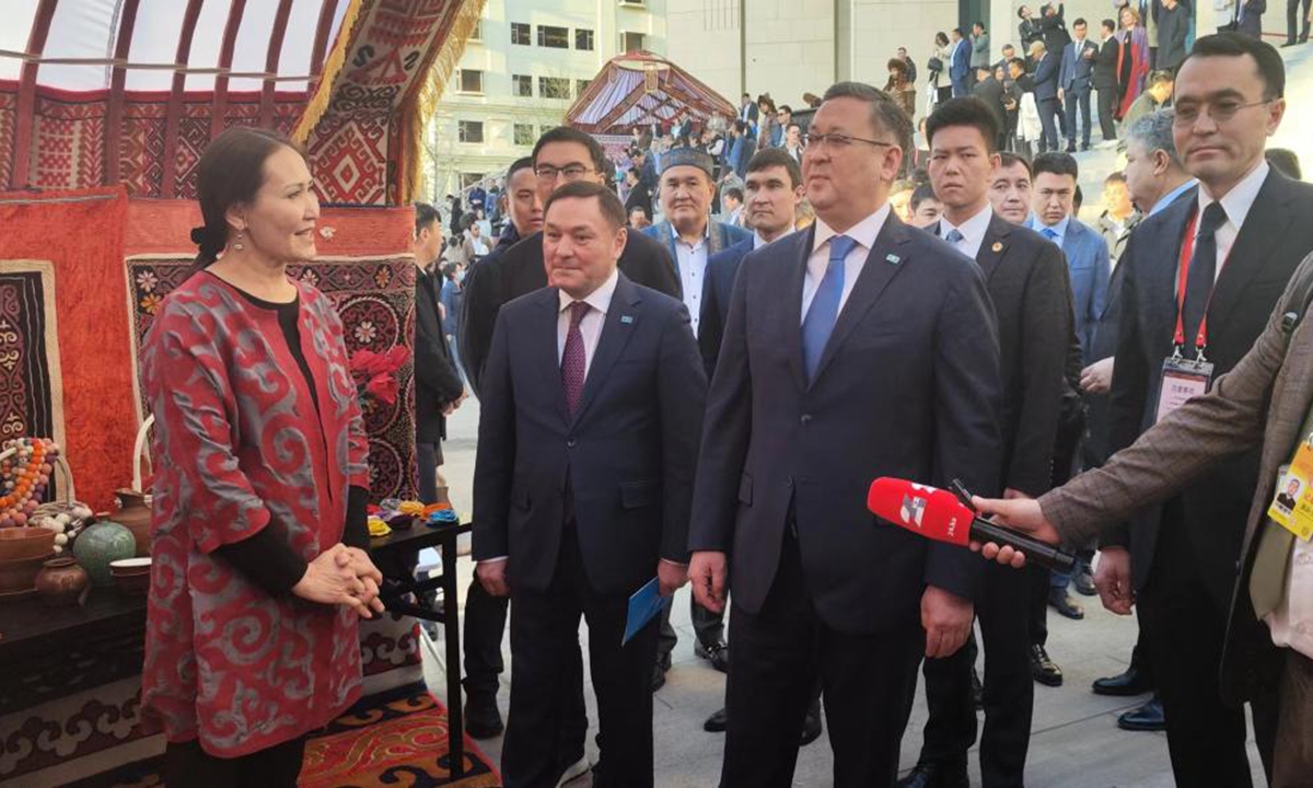 Kazakh Deputy Prime Minister and Foreign Minister Mukhtar Tileuberdi (3rd from the right)，Kazakh Minister of Tourism and Sports Yermek Marzhikpayev (2nd from the right) attend the opening ceremony of Kazakhstan Tourism Year in China in Beijing on March 29, 2024.