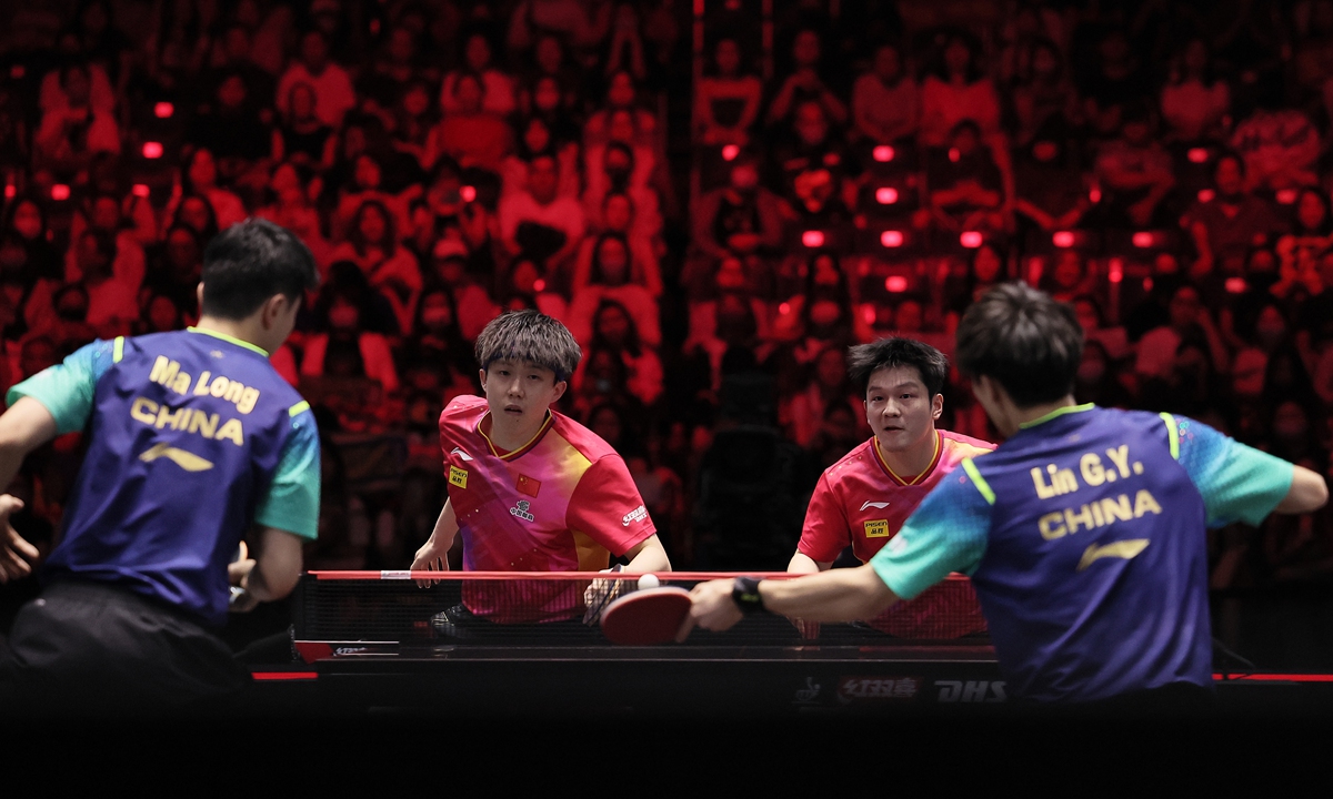 China's Ma Long (left) and Lin Gaoyuan (right) play against compatriots Wang Chuqin (second from left) and Fan Zhendong in the men's doubles final of the World Table Tennis Singapore Smash 2024 in Singapore, on March 16, 2024. Photo: VCG