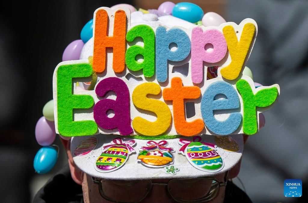 A man wearing an Easter hat is seen during the 2024 Toronto Beaches Lions Easter Parade in Toronto, Canada, on March 31, 2024.(Photo: Xinhua)