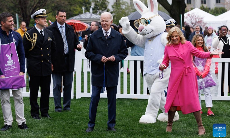 U.S. President Joe Biden (C) and his wife Jill Biden (1st R, Front) attend the annual Easter Egg Roll on the South Lawn of the White House in Washington, D.C., the United States, on April 1, 2024.(Photo: Xinhua)