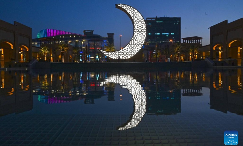 An illuminated steel sculpture of a crescent is seen at Al-Kout Mall in Ahmadi Governorate, Kuwait, March 31, 2024. Kuwait set the Guinness World Record for the world's largest illuminated steel sculpture of a crescent on Sunday. The crescent's height is measured 15 meters and the feat was approved by the Guinness Book of World Records.(Photo: Xinhua)