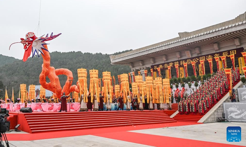 A Chinese dragon-shaped installation is seen at a ceremony paying homage to Huangdi, or the Yellow Emperor, in Huangling County, northwest China's Shaanxi Province, April 4, 2024. 