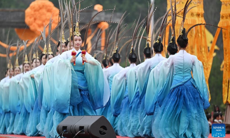 Actresses perform at a ceremony paying homage to Huangdi, or the Yellow Emperor, in Huangling County, northwest China's Shaanxi Province, April 4, 2024. 
