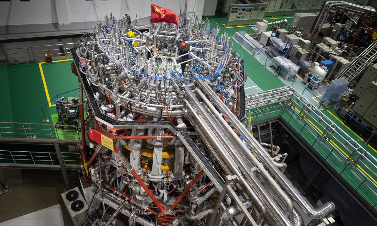 Picture shows China's new-generation tokamak Huanliu-3 (HL-3) or artificial sun, in operation at the Southwestern Institute of Physics (SWIP). Photos: Courtesy of SWIP 