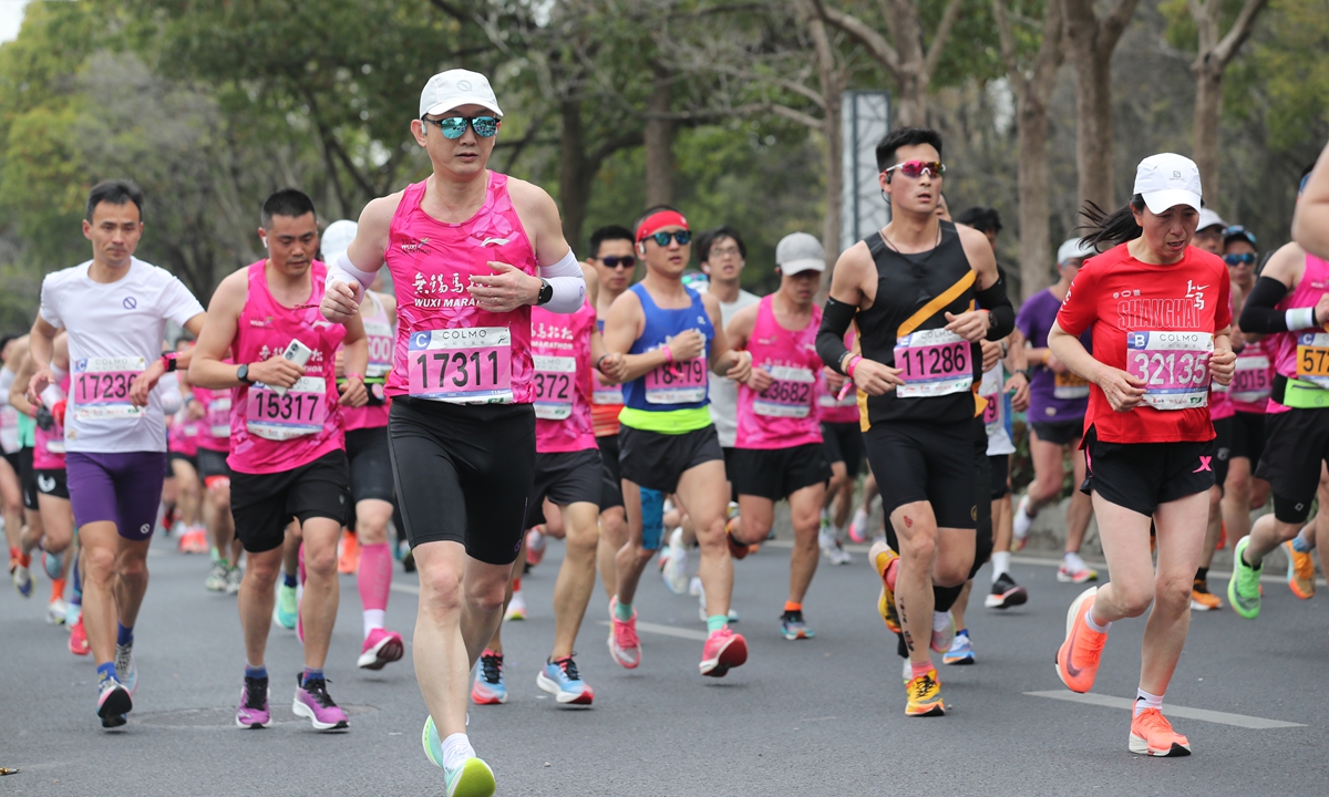 Participants compete in the Wuxi Marathon Photo:IC 