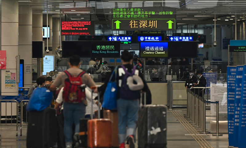 Travelers from Hong Kong enter a land port in Shenzhen, South China's Guangdong Province. Photo: VCG