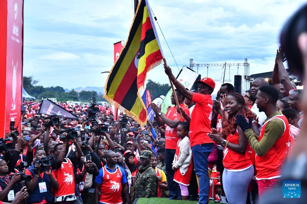 People attend the opening ceremony of the Kabaka Birthday Run 2024 in Kampala, Uganda, on April 7, 2024. Thousands of Ugandans took part in a mega run on Sunday organized by the Buganda Kingdom to raise funds for the fight against HIV and AIDS in the East African country.(Photo: Xinhua)
