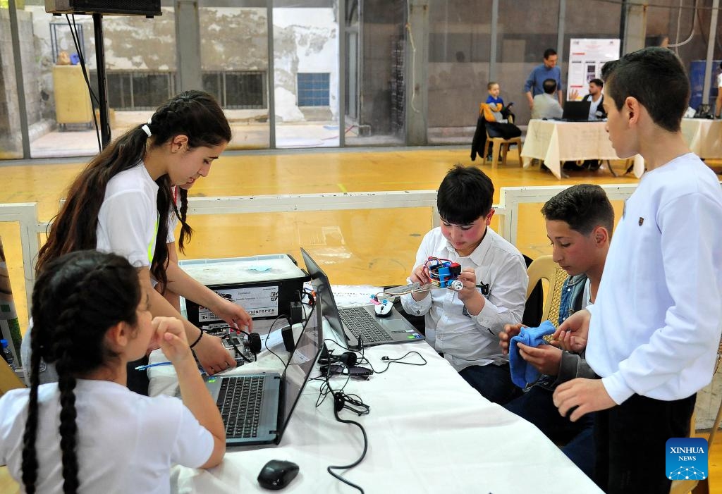Contestants are pictured at a robotics championship in Damascus, Syria, on April 6, 2024.(Photo: Xinhua)