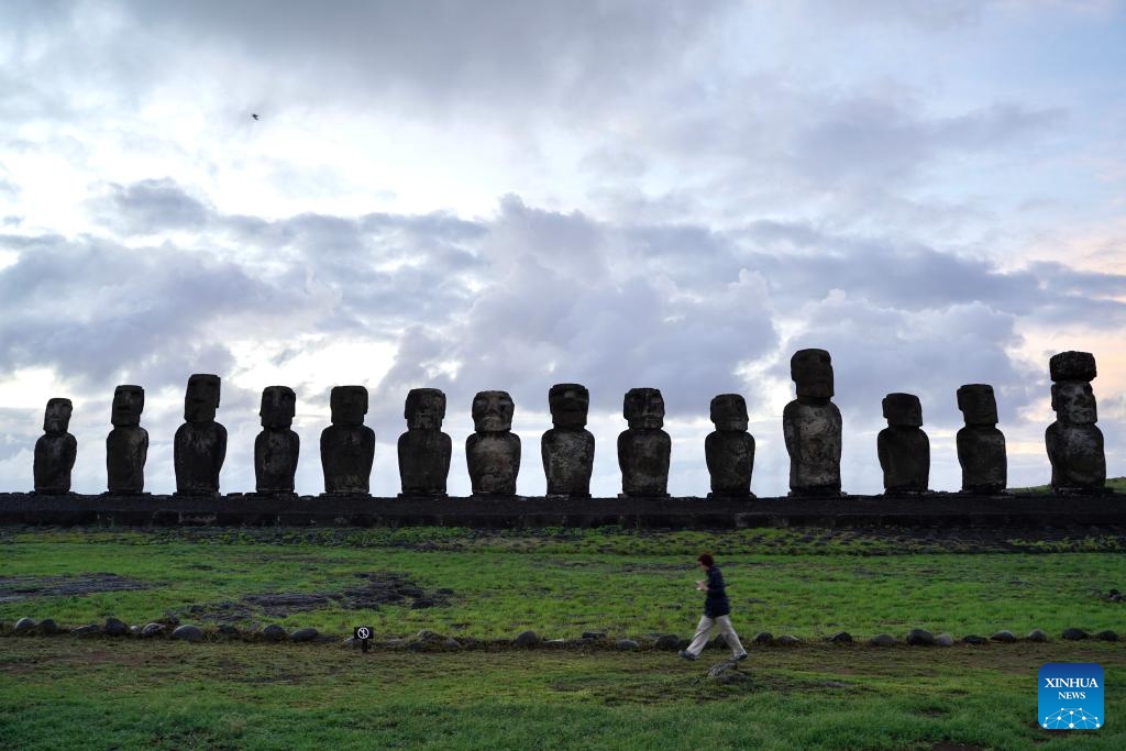 This photo taken on April 5, 2024 shows Moai stone statues on Easter island of Chile. Easter Island, known for its giant stone-carved heads facing out to sea, is located at the southernmost point of the Polynesian Triangle in the South Pacific, and is considered one of the world's remotest inhabited regions.(Photo: Xinhua)