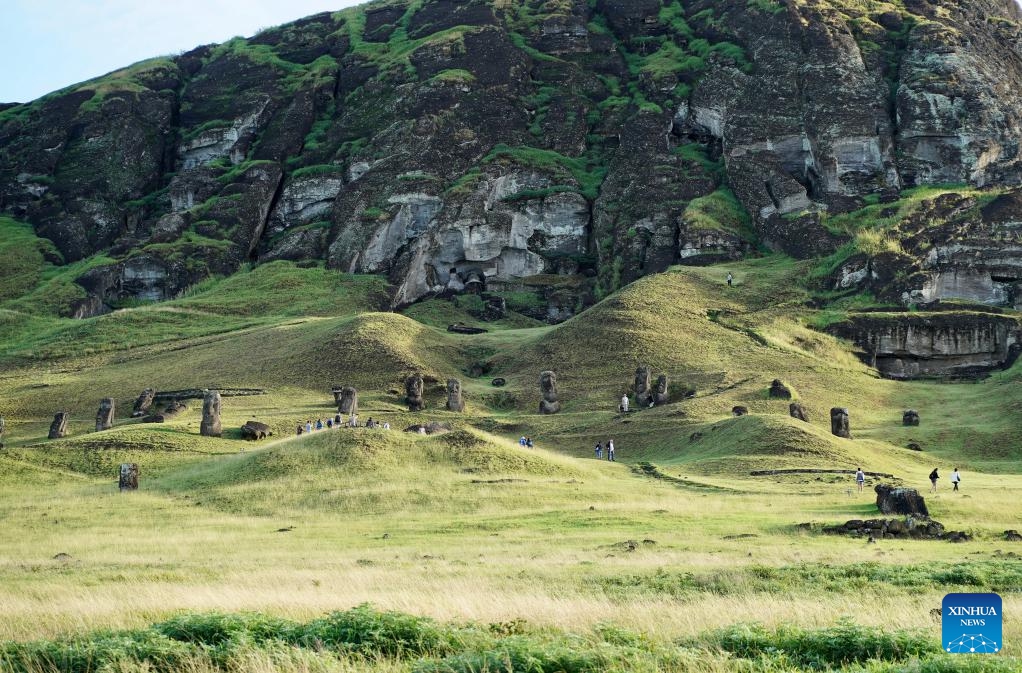This photo taken on April 5, 2024 shows Moai stone statues on Easter island of Chile. Easter Island, known for its giant stone-carved heads facing out to sea, is located at the southernmost point of the Polynesian Triangle in the South Pacific, and is considered one of the world's remotest inhabited regions.(Photo: Xinhua)