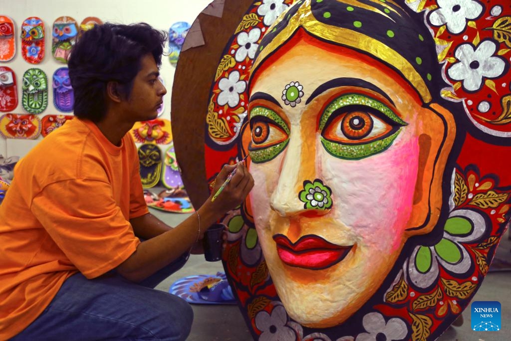 A student paints traditional paper works for the Bengali New Year in Dhaka, Bangladesh, April 7, 2024. The Bengali New Year is usually celebrated every year on April 14.(Photo: Xinhua)