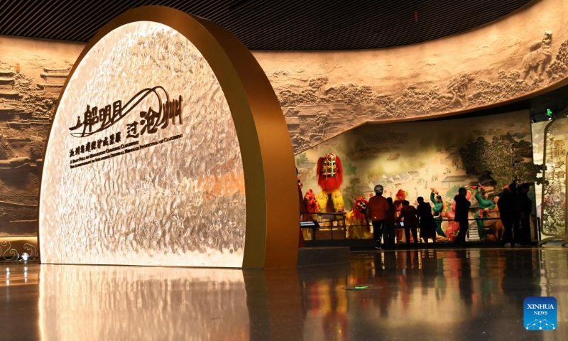 Tourists visit an exhibition hall on intangible cultural heritage alongside China's Grand Canal, in Cangzhou, north China's Hebei Province, April 19, 2024. (Xinhua/Yang Shiyao)