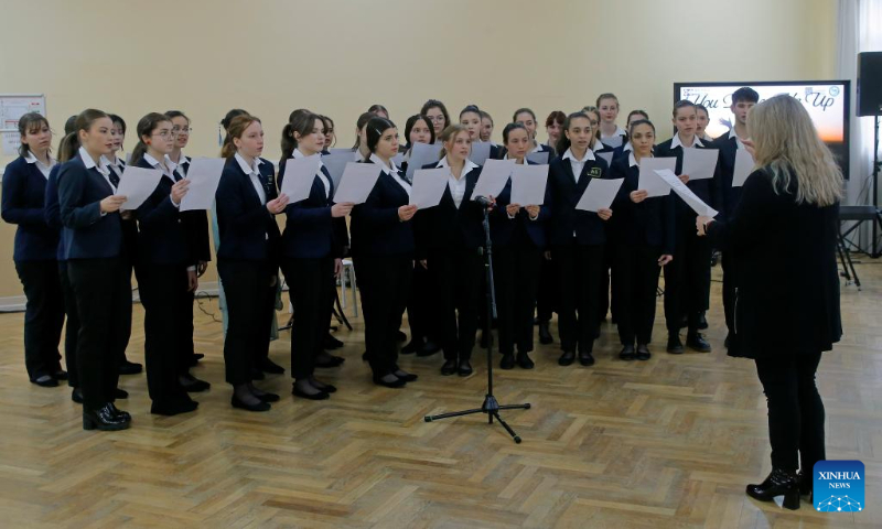 A student choir performs during an event organized by Confucius Institute of Transilvania University of Brasov to mark the UN Chinese Language Day in Brasov, central Romania, April 19, 2024. (Photo by Cristian Cristel/Xinhua)