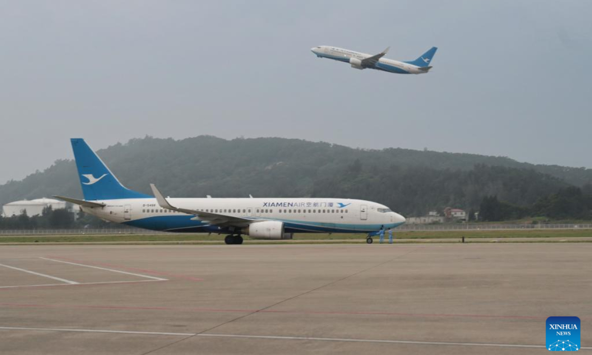The Flight MF883 waits to take off at the Fuzhou Changle International Airport in Fuzhou, southeast China's Fujian Province, May 22, 2023. Phoro:Xinhua 