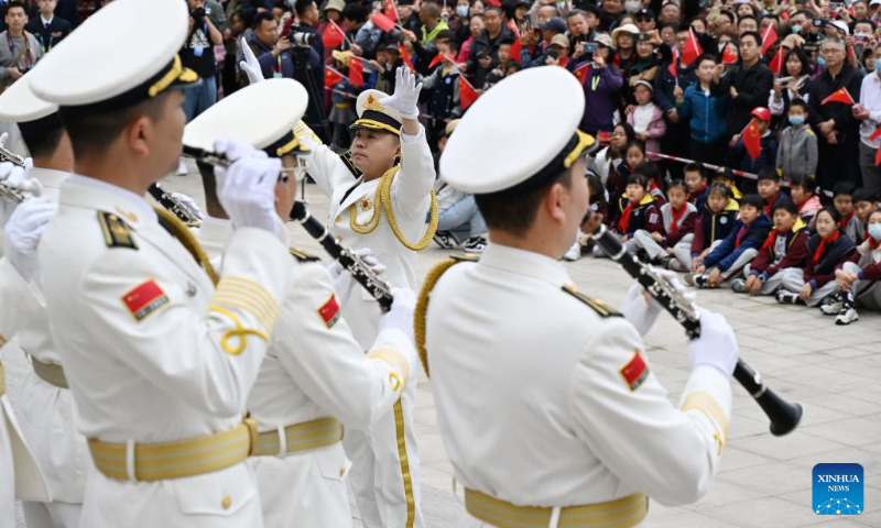 A military band performs at the Chinese People's Liberation Army (PLA) Navy Museum to celebrate the 75th founding anniversary of the Chinese PLA Navy in Qingdao, east China's Shandong Province, April 20, 2024. (Xinhua/Li Ziheng)