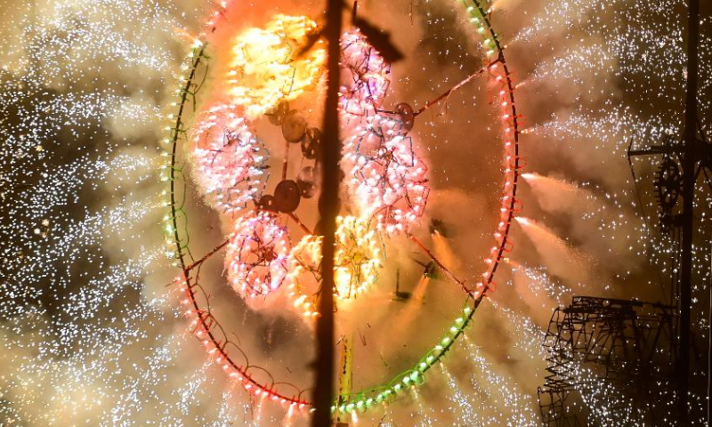 People view fireworks during a pre-festival event of the Malta International Fireworks Festival in Floriana, Malta, April 13, 2024. (Photo by Jonathan Borg/Xinhua)