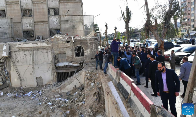 Iranian Foreign Minister Hossein Amir-Abdollahian, Syrian Foreign Minister Faisal Mekdad and other officials check the site of Israeli attack on Iran consulate in Damascus, Syria, on April 8, 2024. Photo: Xinhua