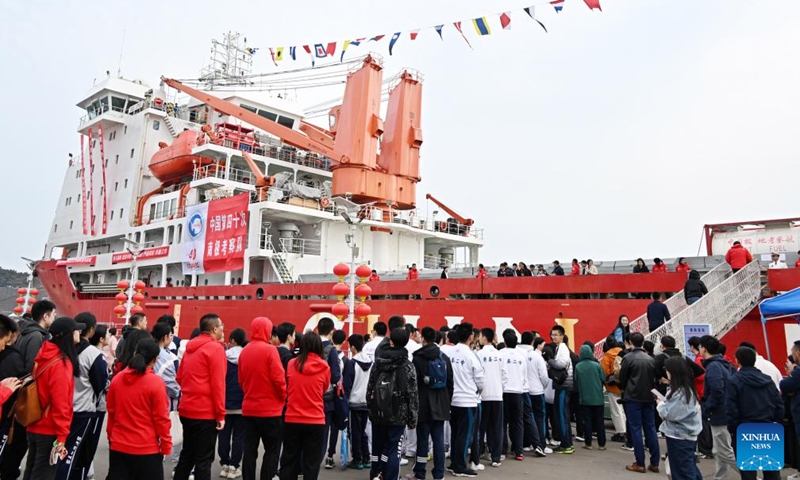 People visit the icebreaker Xuelong at a port in Qingdao, east China's Shandong Province, April 10, 2024. China's research icebreaker Xuelong on Wednesday arrived at a port in Qingdao after completing its latest Antarctic expedition and it will host a three-day open house to the public.(Photo: Xinhua)