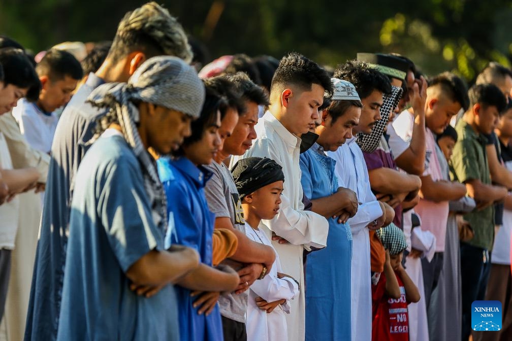 People attend a prayer in celebration of the Eid al-Fitr in Quezon City, the Philippines, on April 10, 2024.(Photo: Xinhua)