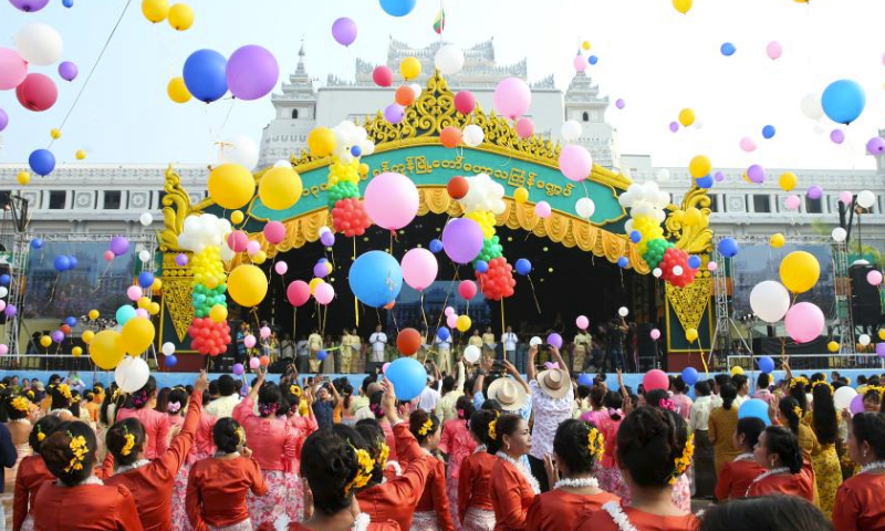 People take part in celebrations of the Thingyan water festival in Yangon, Myanmar, April 13, 2024. Myanmar's vibrant Thingyan water festival kicked off on Saturday, with celebrations taking place across the country. (Photo by Myo Kyaw Soe/Xinhua)
