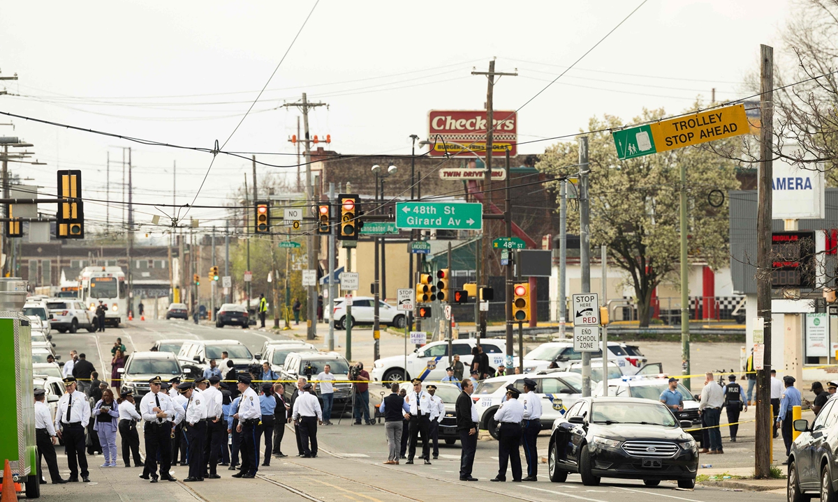 Police gather at an intersection after a shooting during a large Muslim religious celebration in a park in Philadelphia, Pennsylvania, on April 10, 2024 local time. Five people have been arrested, four of whom are juveniles, said local police. Three people were injured in the shooting. Police said around 1,000 people were in attendance for the event celebrating Eid al-Fitr, which marks the end of Ramadan. Photo: VCG
