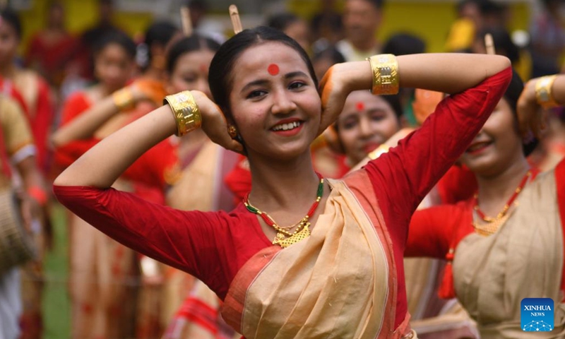 People perform folk dance during the celebration for the upcoming Rangoli Bihu Festival in Guwahati city of India's northeastern state of Assam, April 10, 2024.(Photo: Xinhua)