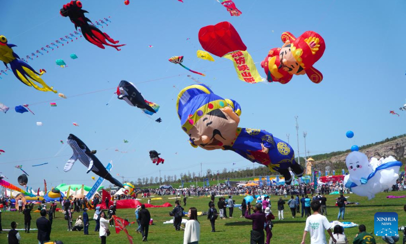 This photo taken on April 20, 2024 shows kites flying in the sky at the 41st Weifang International Kite Festival in Weifang, east China's Shandong Province. The annual kite gala kicked off here Saturday. (Xinhua/Xu Suhui)