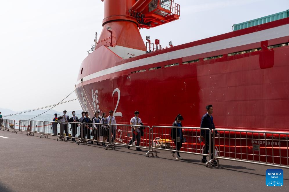 Visitors walk to board China's icebreaker Xuelong 2 in Hong Kong, south China, April 10, 2024. China's first domestically made icebreaker Xuelong 2 arrived in Hong Kong for a five-day visit, expecting to receive 8,500 visitors. Xuelong 2, which came to Hong Kong for the very first time, entered the Ocean Terminal in Tsim Sha Tsui on Monday morning after completing China's 40th Antarctic expedition.(Photo: Xinhua)