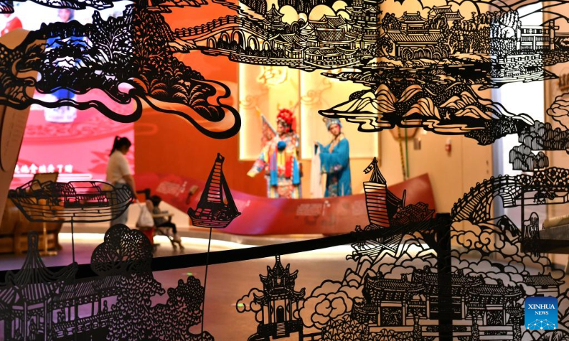 Tourists visit an exhibition hall on intangible cultural heritage alongside China's Grand Canal, in Cangzhou, north China's Hebei Province, April 19, 2024. (Xinhua/Yang Shiyao)