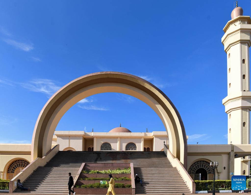 People walk past the gate of the Uganda National Mosque in Kampala, Uganda, March 31, 2024.(Photo: Xinhua)