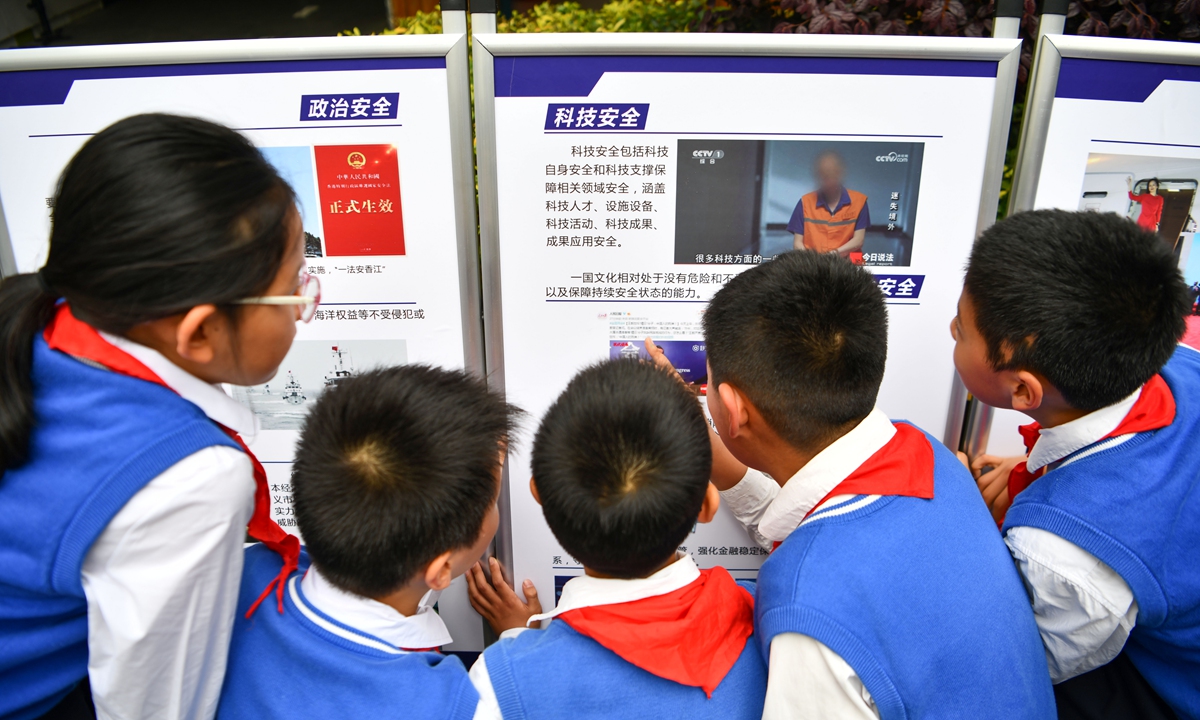 Students view a national security education exhibition at a primary school in Hefei, East China's Anhui Province, on April 11, 2024.Photo: VCG