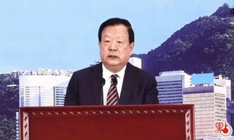 Xia Baolong, head of the Hong Kong and Macao Work Office of the Communist Party of China Central Committee and the Hong Kong and Macao Affairs Office of the State Council, makes a speech via video at the opening ceremony of 2024 National Security Education Day. Photo: Dotdotnews.com