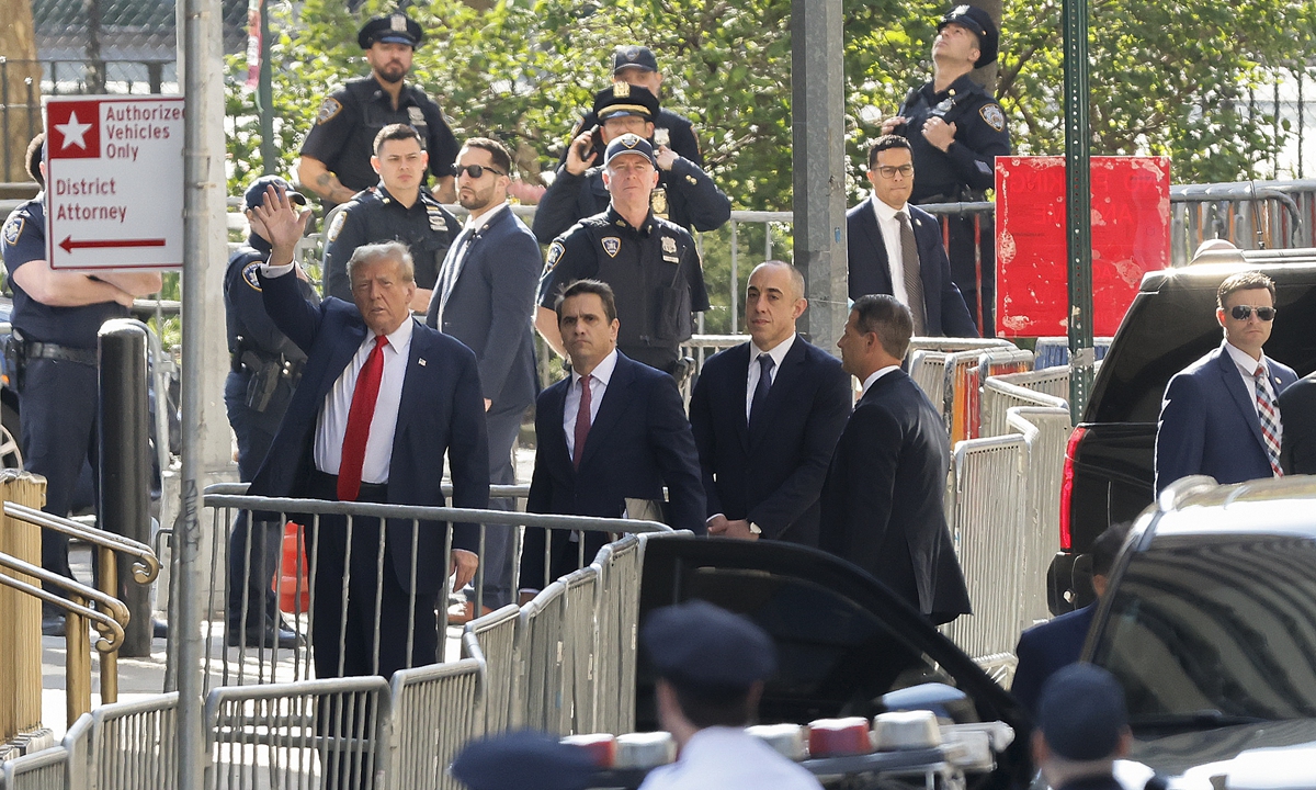 Former US president Donald Trump (left) arrives at Manhattan criminal court with his legal team on April 15, 2024, in New York. The hush money trial of Trump begins Monday with jury selection. It's a singular moment for American history as the first criminal trial of a former US commander in chief. Photo: VCG