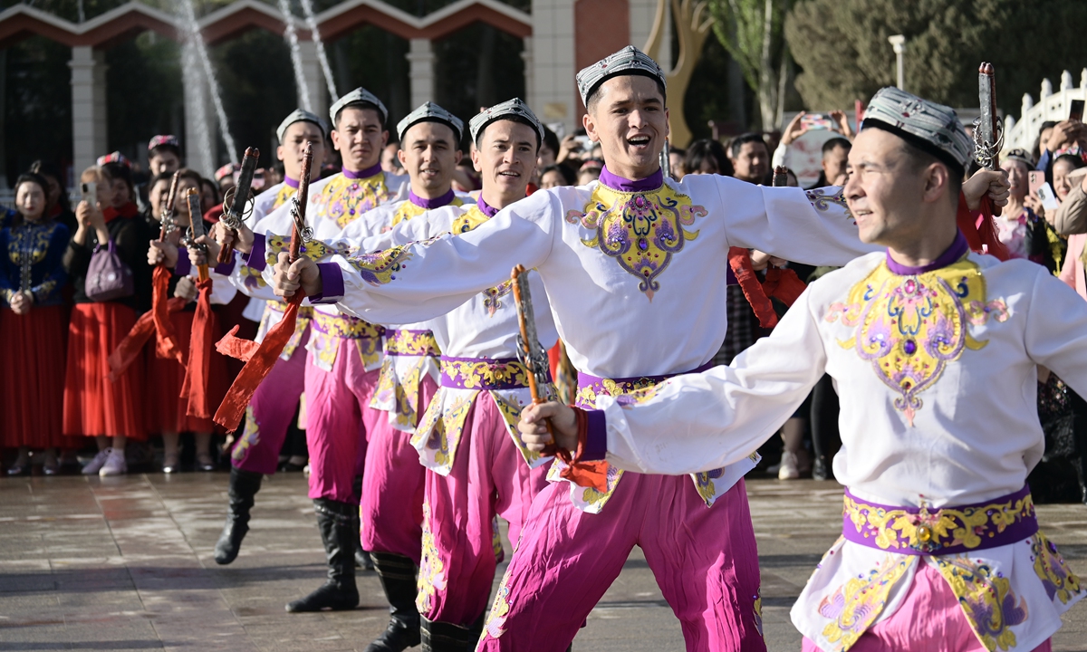 Local people celebrate the Eid al-Fitr on April 10, 2024, at the People's Square of Kashi City. Photo: Tao Mingyang/GT