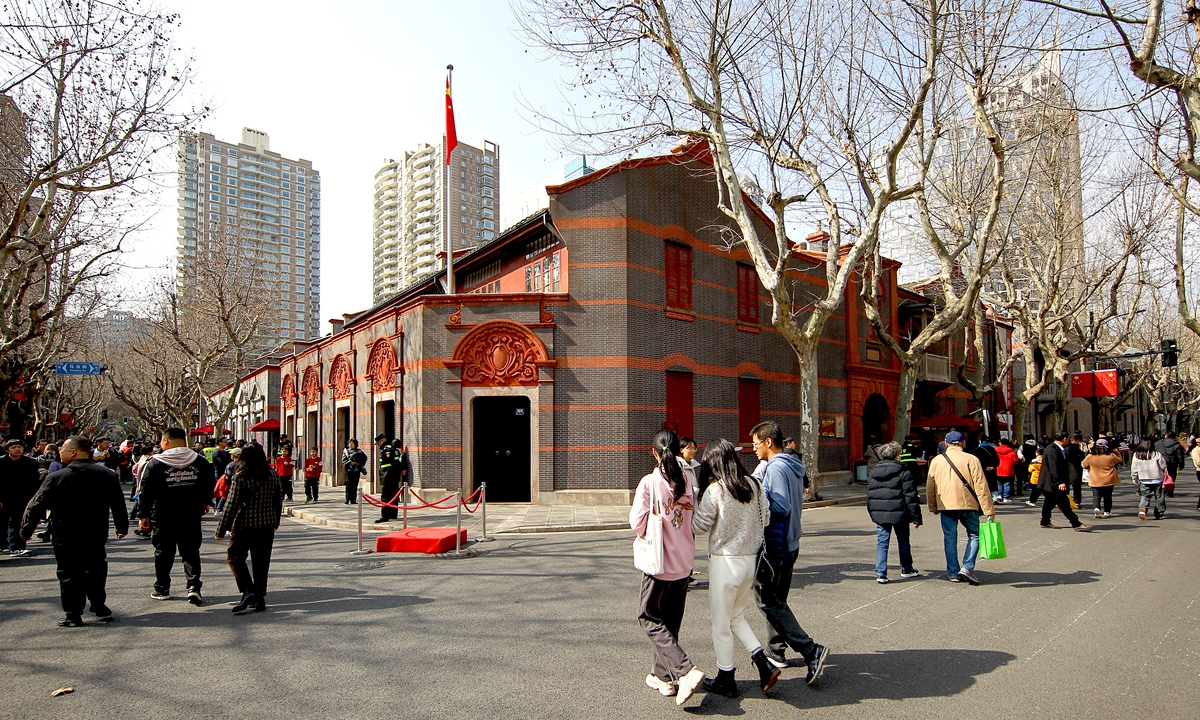 Tourists visit the Memorial Hall of the First National Congress of the CPC in Shanghai. Photo: VCG