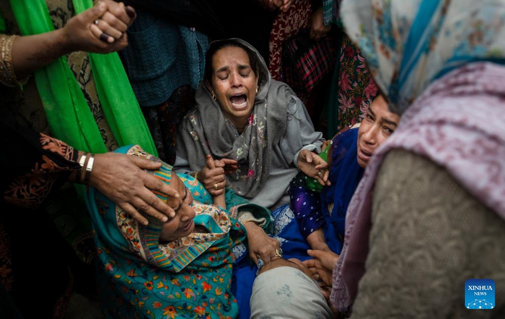 Women cry after a boat carrying their relatives capsized in a river in Srinagar, the summer capital of Indian-controlled Kashmir, April 16, 2024. At least six people, including four school children, were killed and many others went missing Tuesday after a boat carrying them capsized in Indian-controlled Kashmir, officials said.(Photo: Xinhua)