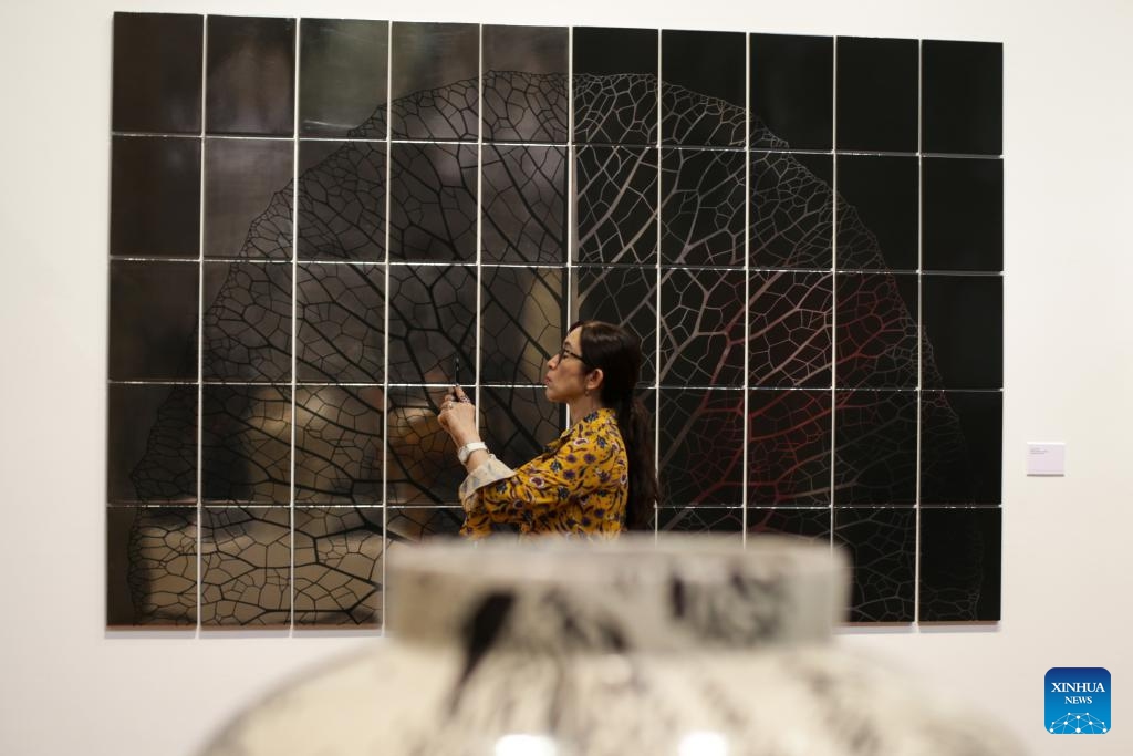 A woman visits the Atlas exhibition by artists Jan Hendrix of the Netherlands at the Citibanamex Culture Palace, in Mexico City, Mexico, April 16, 2024.(Photo: Xinhua)