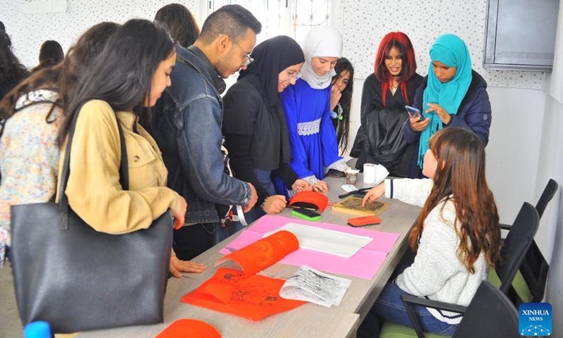 Students learn inscription rubbing in the Confucius Institute at Carthage University in Tunis, Tunisia, on April 17, 2024. Tunisia on Wednesday celebrated this year's United Nations Chinese Language Day, which falls on April 20, by holding a cultural event here in the capital city.(Photo: Xinhua)